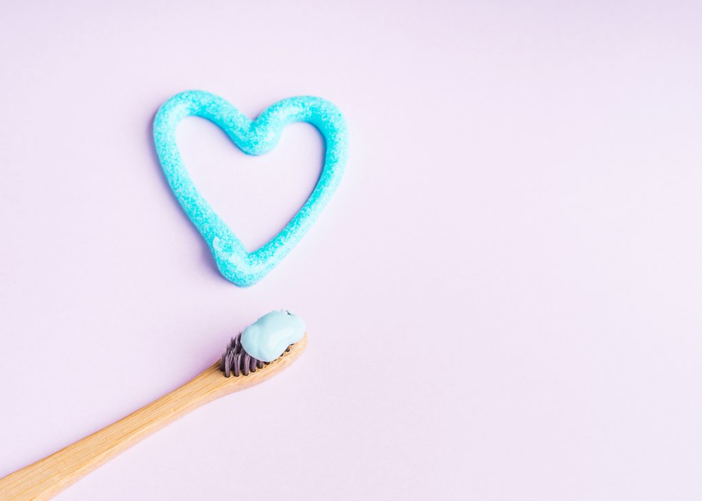 heart-made-with-blue-toothpaste-and-bamboo-toothbr-2023-11-27-05-18-17-utc-1024x731